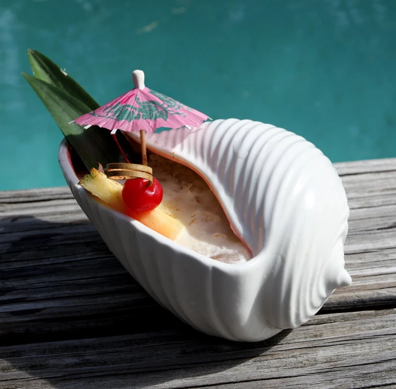 tiki-drinkware-shell-painkiller-cocktail-pool.jpg BarProducts.com BarConic® Tiki Drinkware - Shell - 18 Ounce